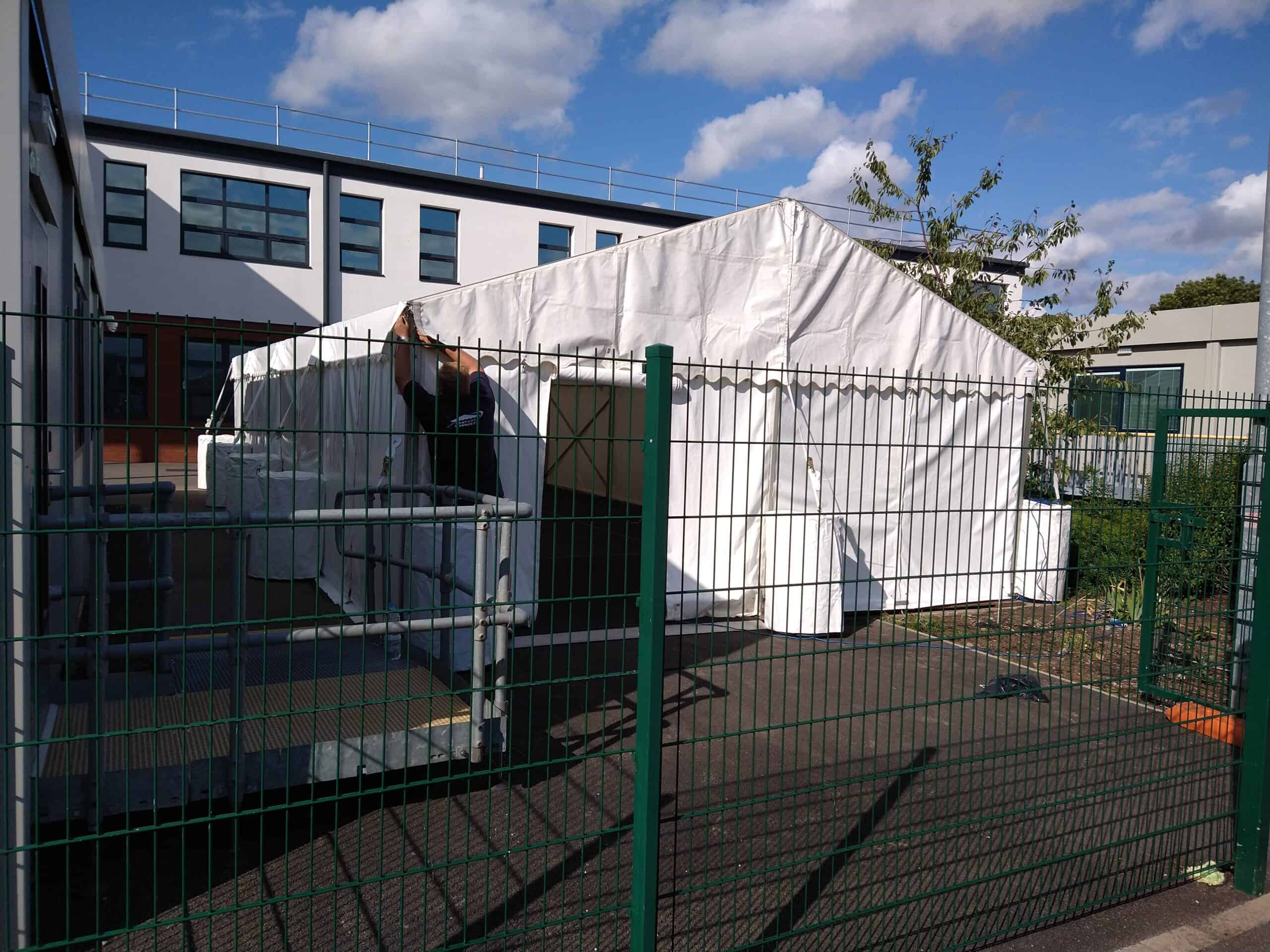 Marquee tent set up for outdoor event in Leicester.