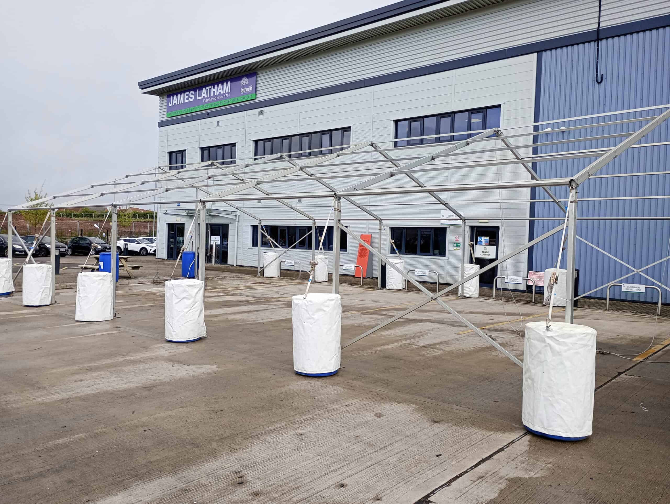 Temporary marquee structure being assembled outside James Latham building in Leicester.